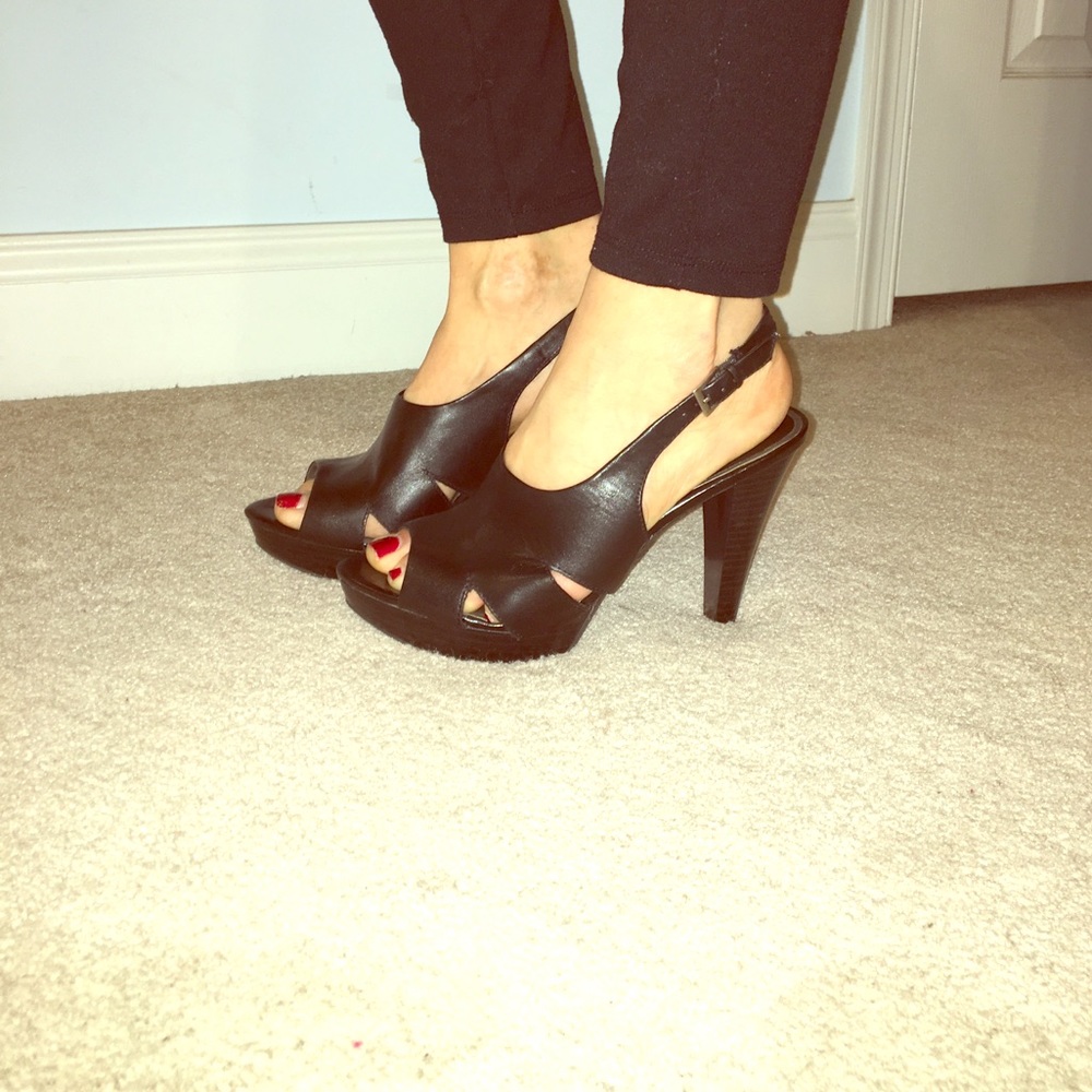 Black heels never worn.