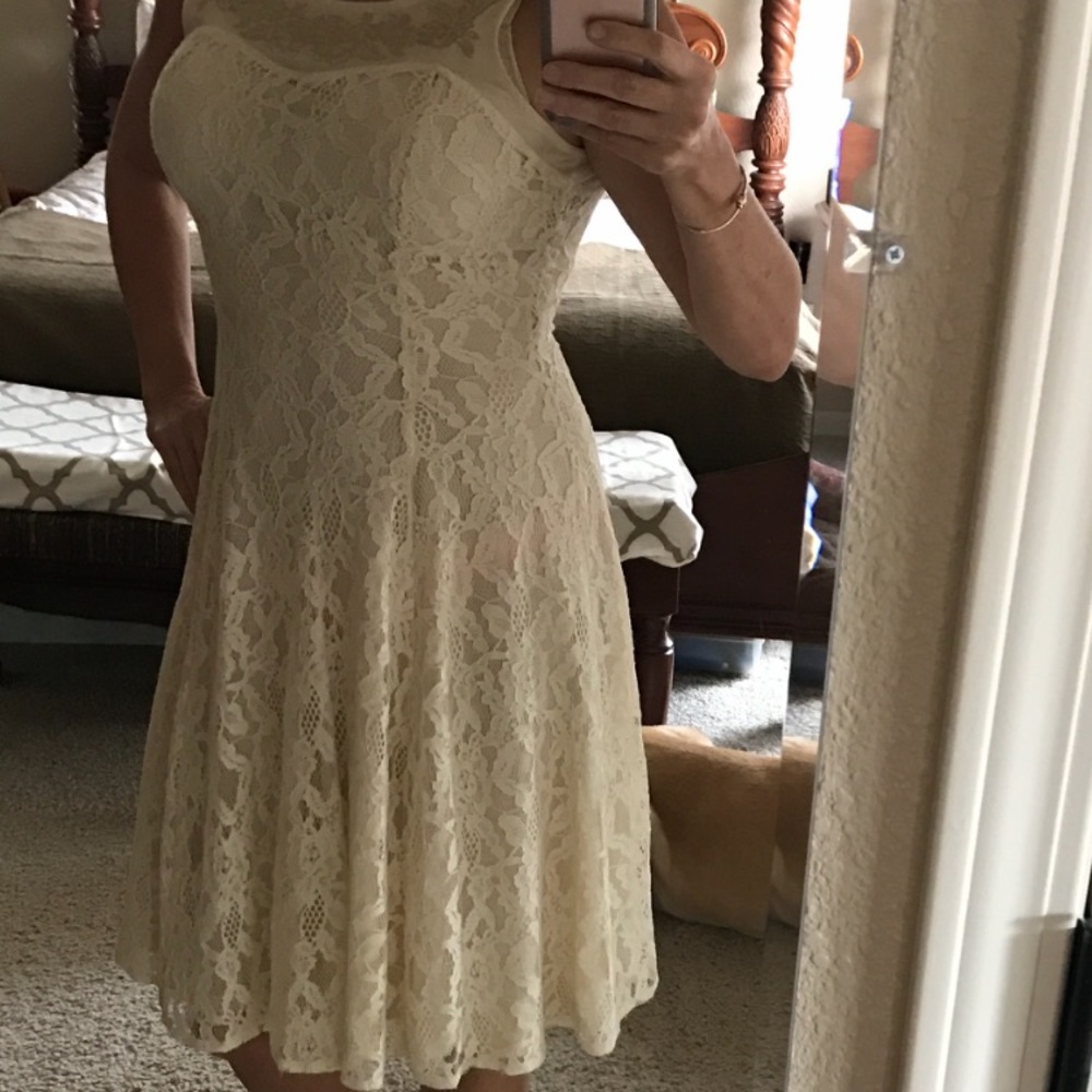 Cream lace dress with embroidered neckline