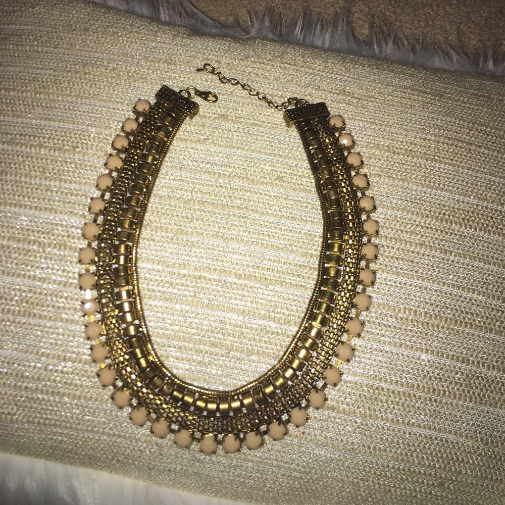 Gold and blush statement necklace.