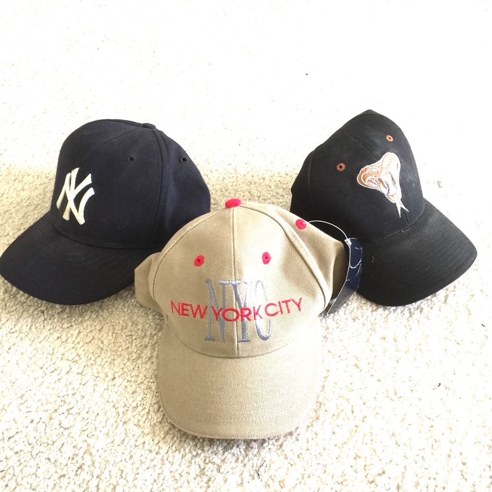 Yankees, NYC, and Diamondback baseball caps