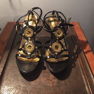 Black and gold patent leather heels