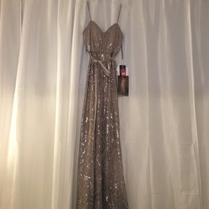 Long, sequin gown. Blush color. Can fit sizes 6-10