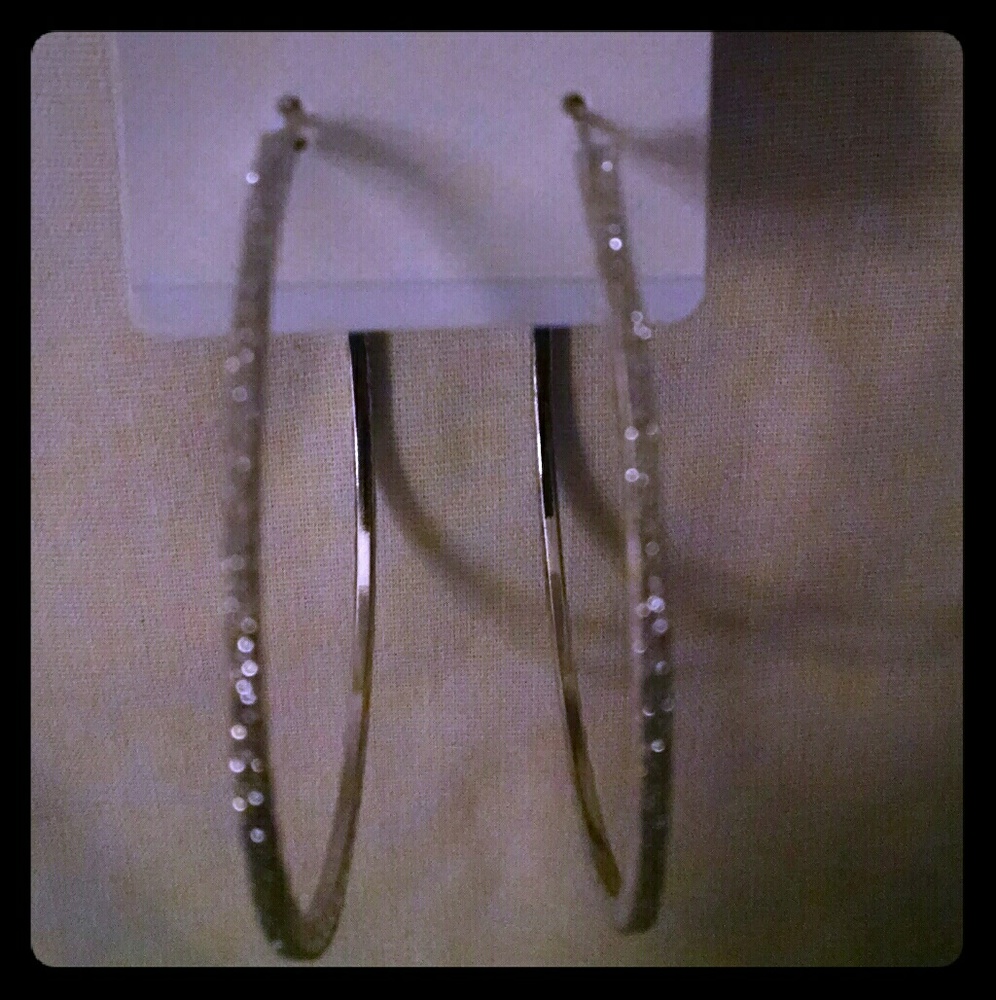 Beautiful gold tone silvertone large hoop earrings
