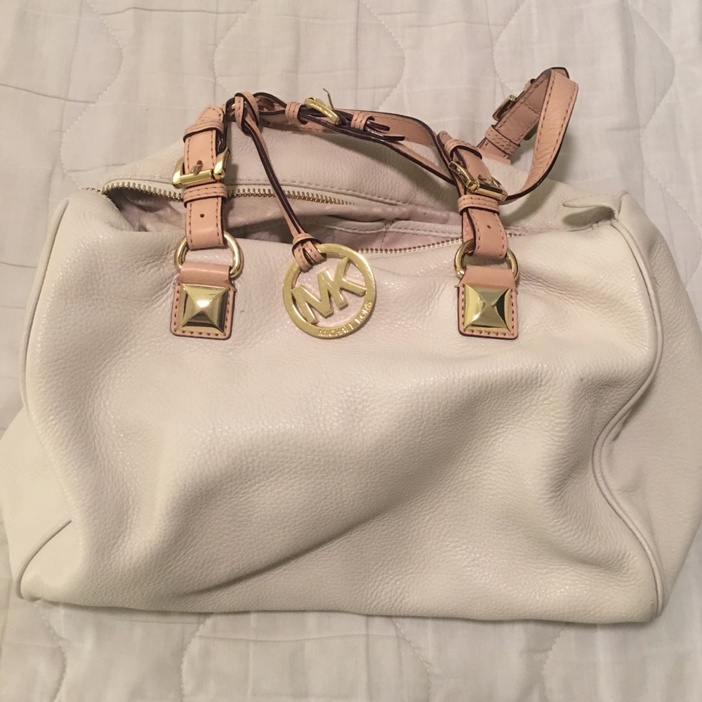 Michael Kors white leather purse.