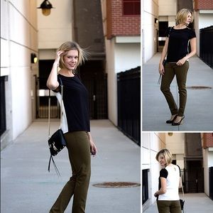 Black and white short sleeved top with gold studs