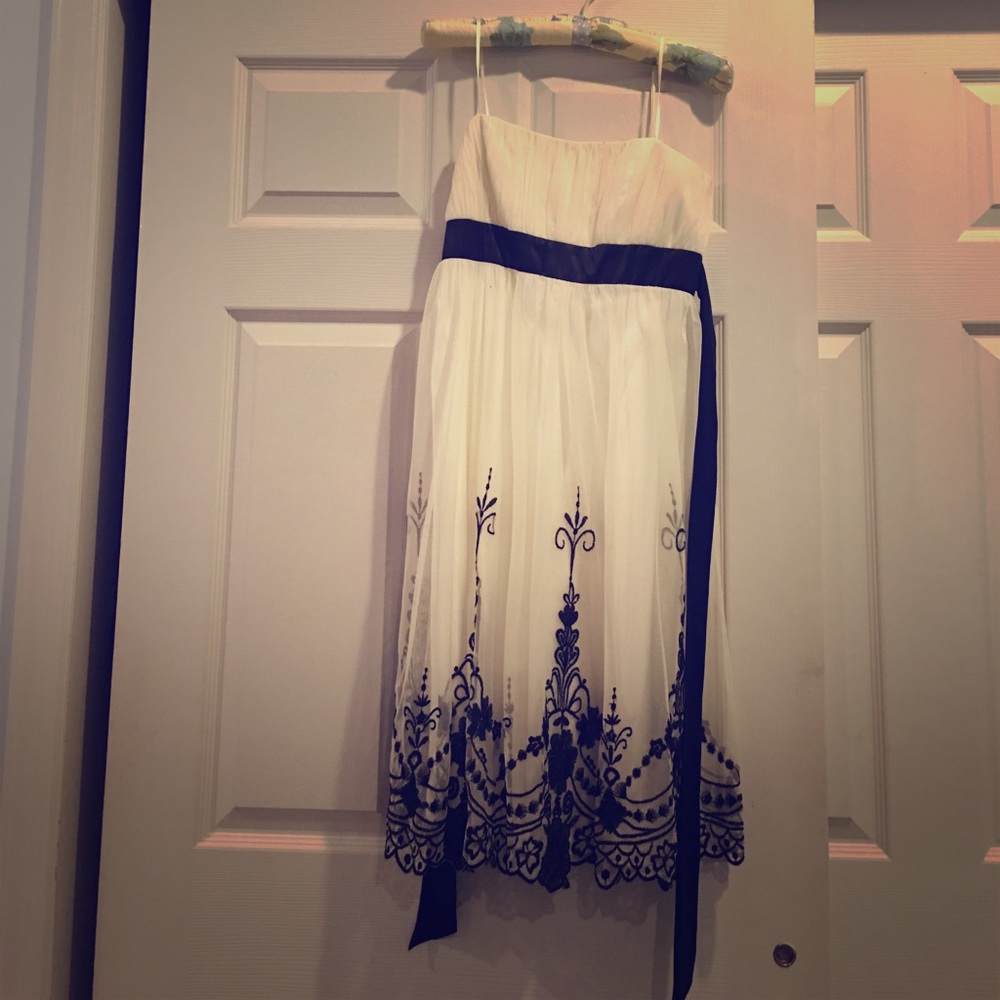 Knee length spaghetti strap formal dress