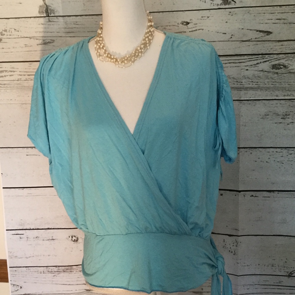 Light blue top by Want, rouched sleeves tie waist