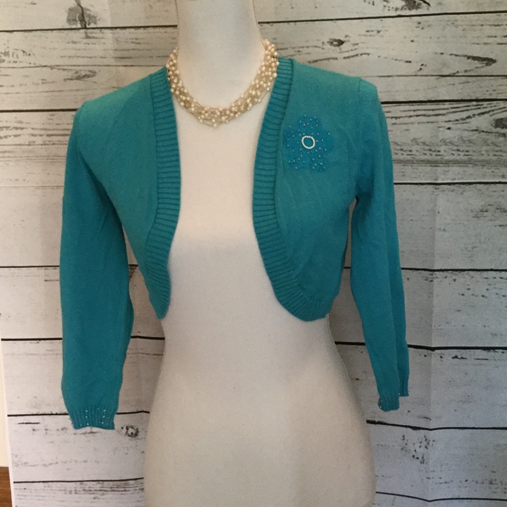 Cute turquoise bolero top with detailed beading