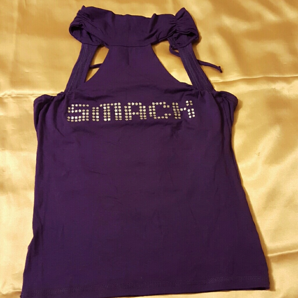 Very cute dark perple shirt.