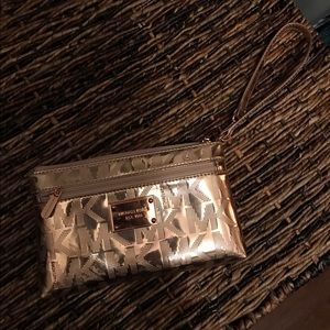 Rose gold Micheal Kors clutch