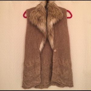 Knit faux fur vest.