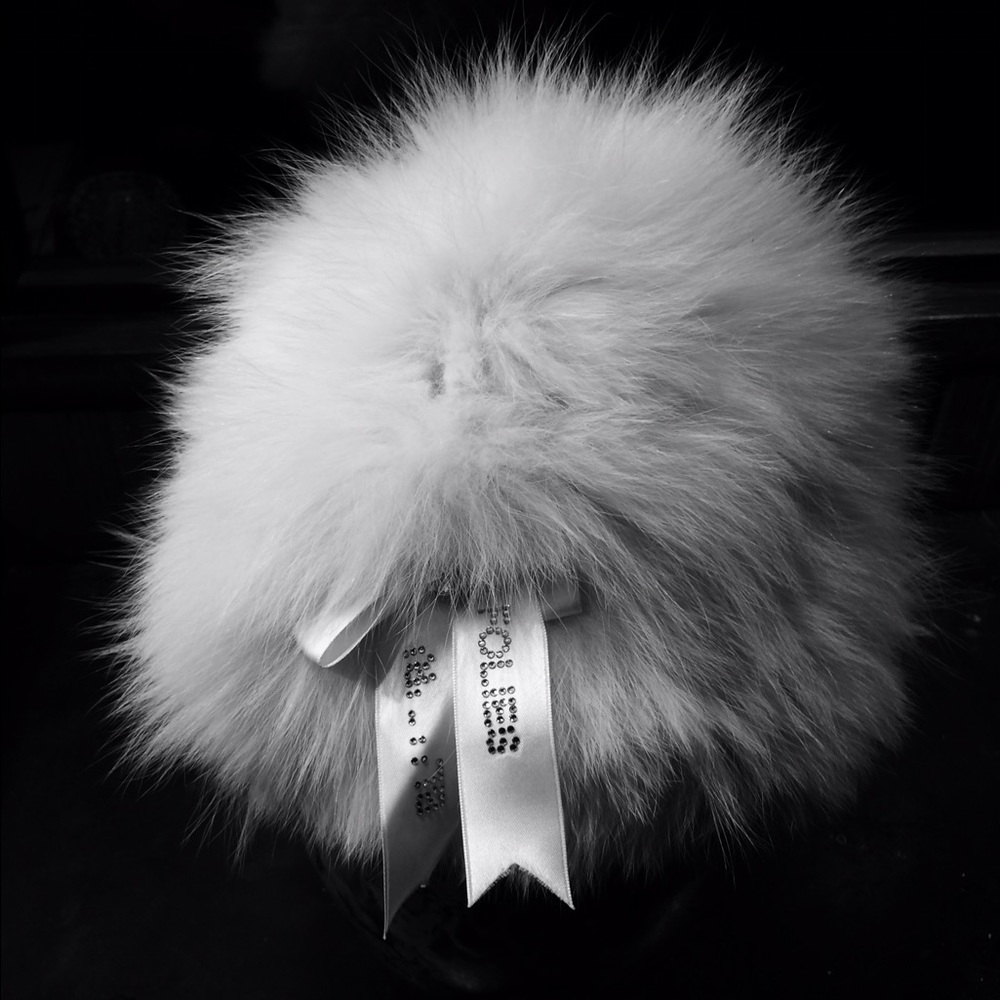 Adorable fluffy white bunny fur hat.