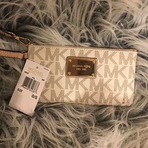 Michael Kors wristlet in vanilla