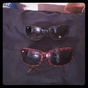 Two pair of authentic women's Ray Ban sunglasses.