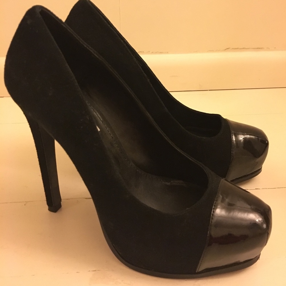 Black suede platform heals with leather toe.