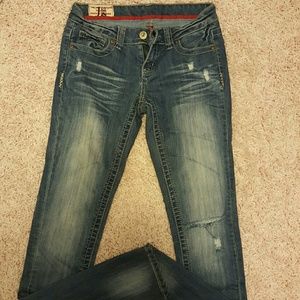 Distressed skinny jeans.