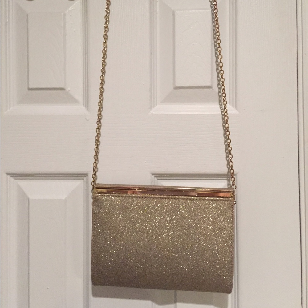 Gold glittery clutch