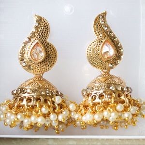 Gold Indian jumkha earrings with pearls