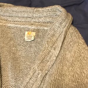 Warm long sleeved sweatered cardigan