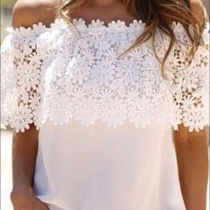 White flowery off the shoulder shirt size m