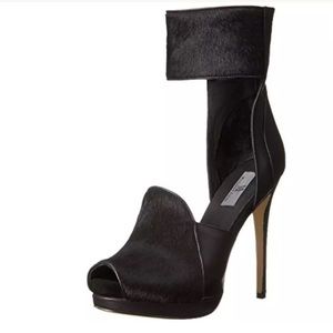 Mia kita black leather and fur platform heels