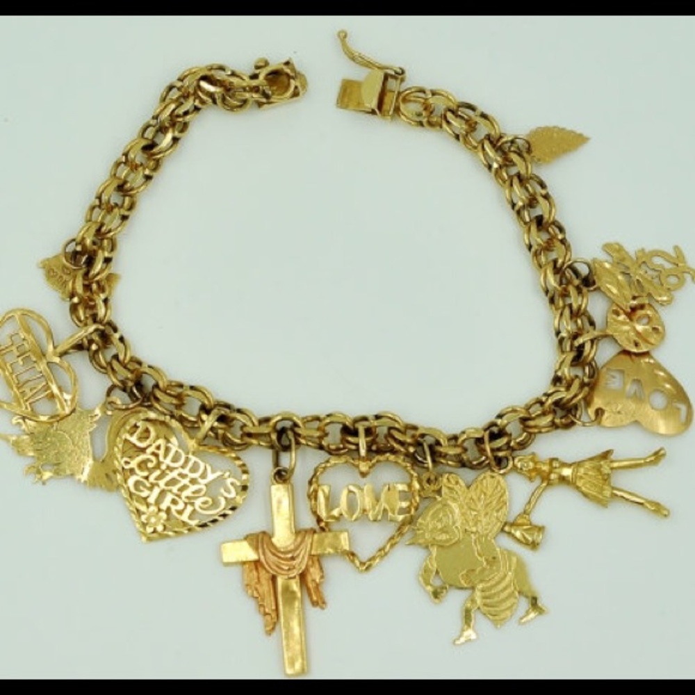Gorgeous 14K Gold Charm Bracelet. Collector's Item