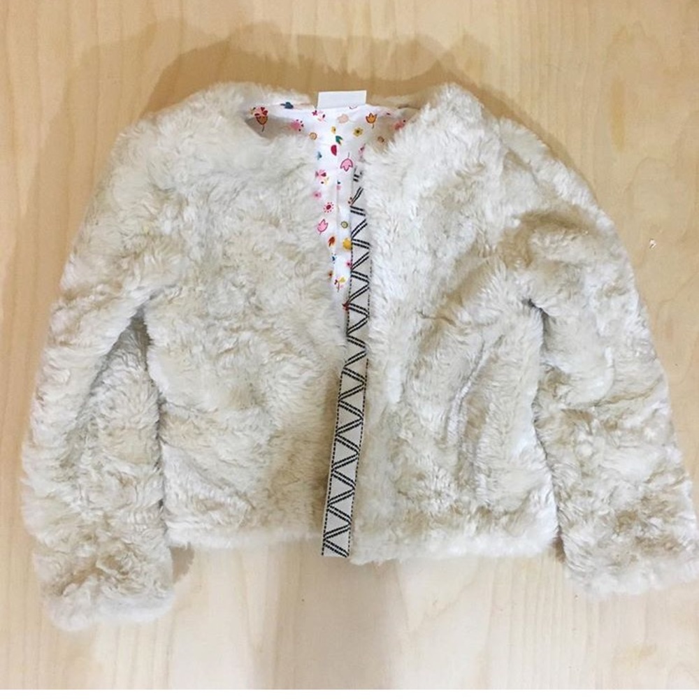 Girls fur jacket.