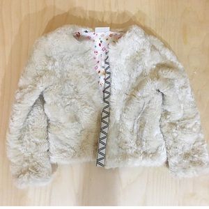 Girls fur jacket.