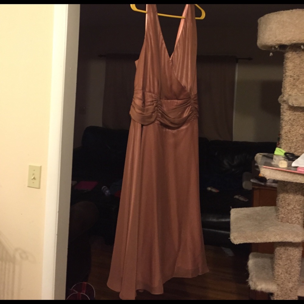 Brown/pinkish bridesmaid dress.