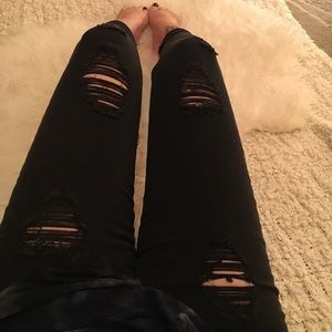Black ripped high waisted packs in jeans
