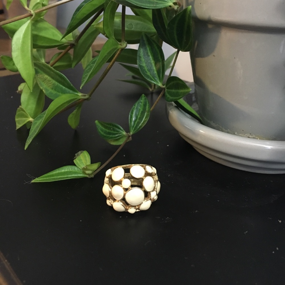 White and gold ring