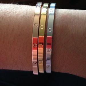 Gold, silver; and rose gold bracelets (set of 3)