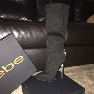 New Bebe pointy toe boot with embellished heel.