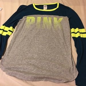 Pink loose or baggy shirt.