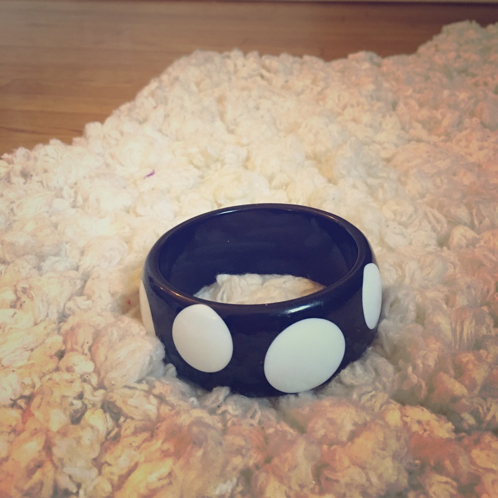 Black bangle with white dots