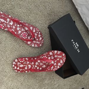 Red florals flip flops coach