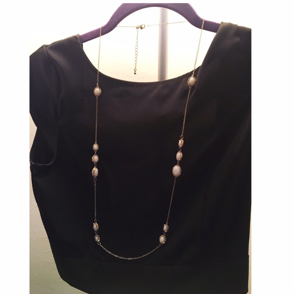Long beaded gold necklace