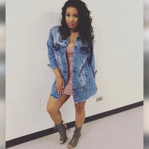 Oversized distressed denim jacket.