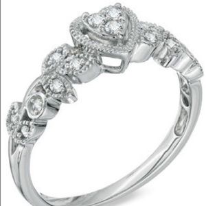 10K white gold  1/8 CT diamond ring