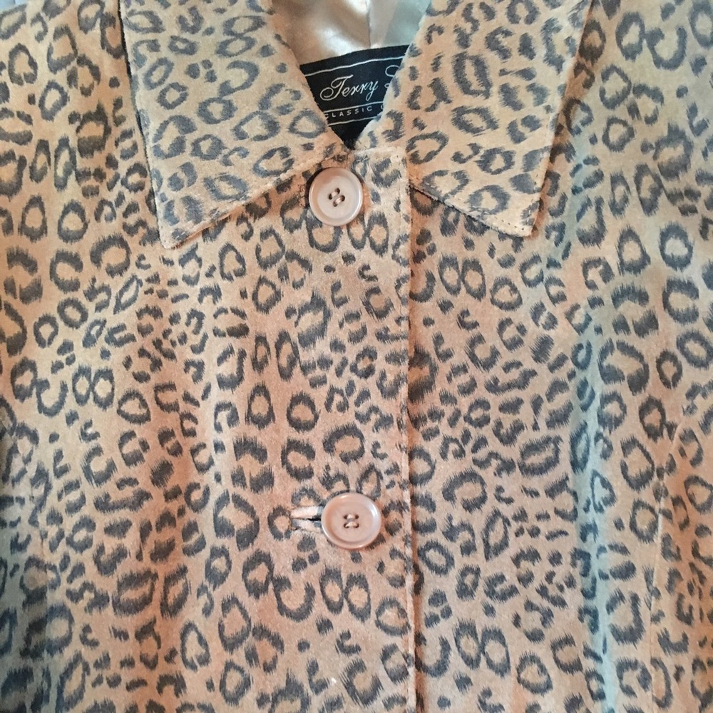 Terry Lewis Leather Cheetha Jacket has pockets