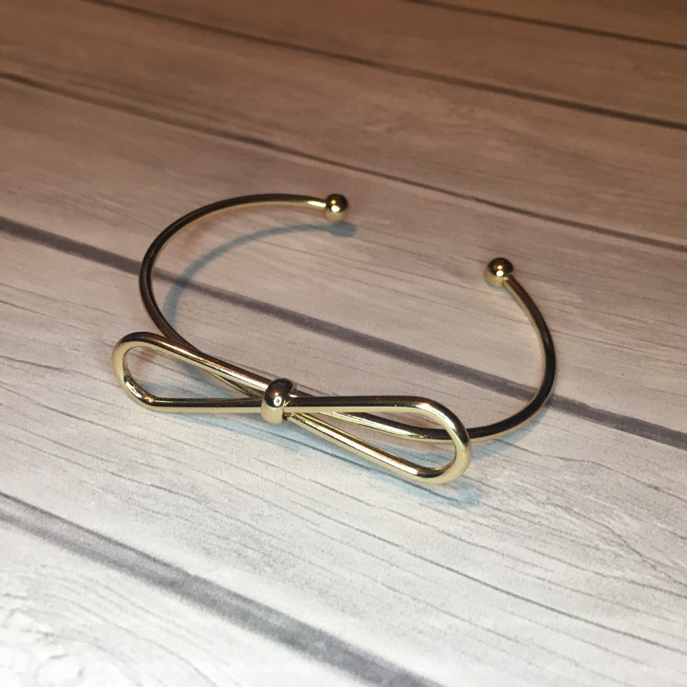 Gold Toned Bow Bangle Bracelet