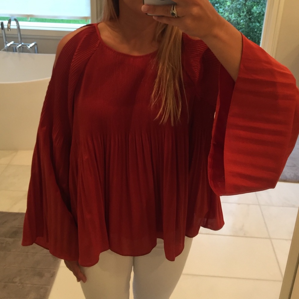 burnt orange bell sleeve split shoulder top