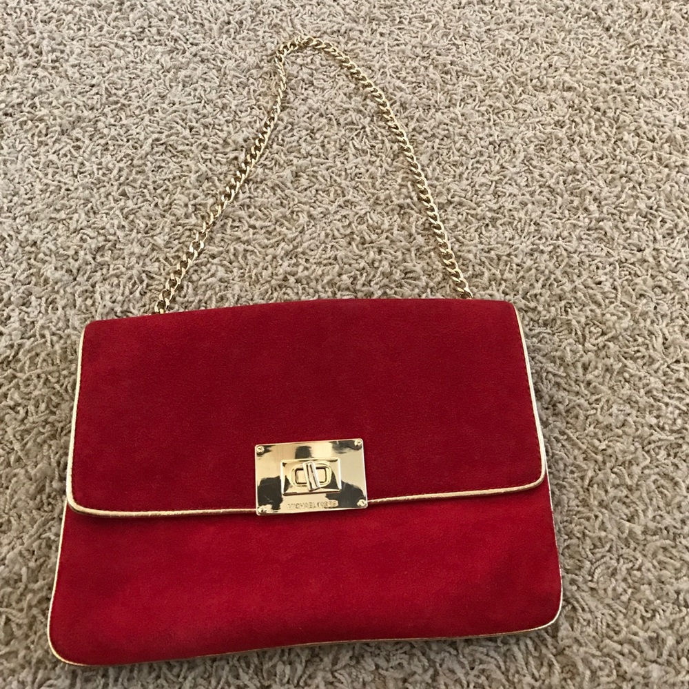 Michael Kors clutch with optional strap