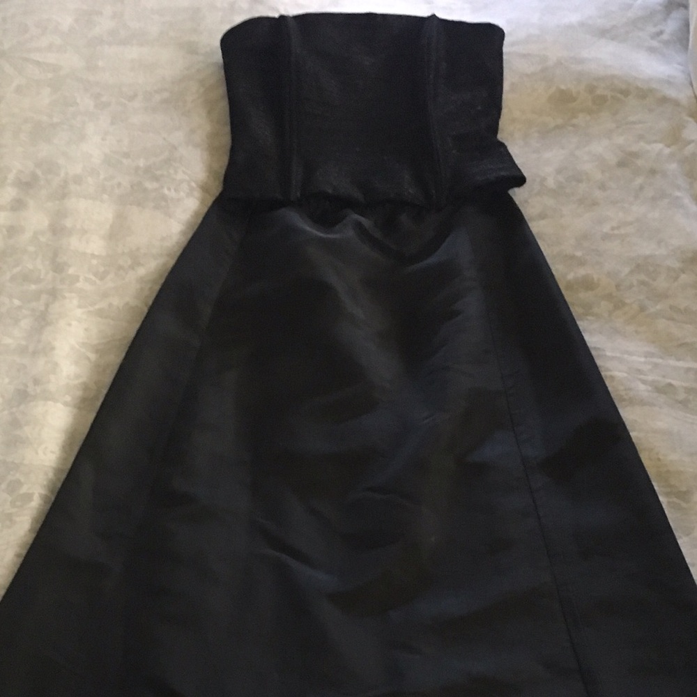 Long A line skirt and corset strapless top.