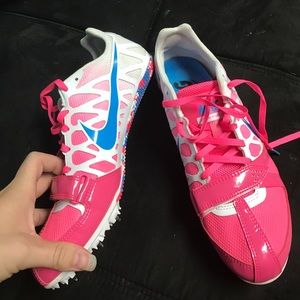 Nike track shoes. Pink and blue with spikes