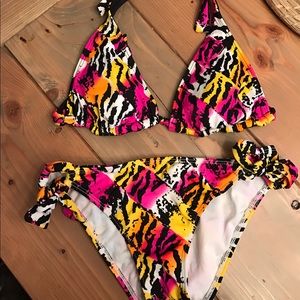 Roxy animal print swim suit with reversible top