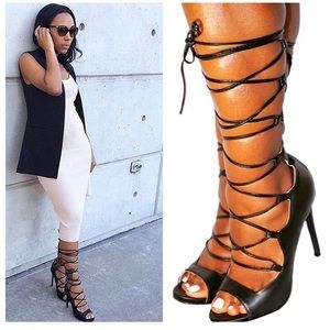 Tie up black Vegan leather shoes.