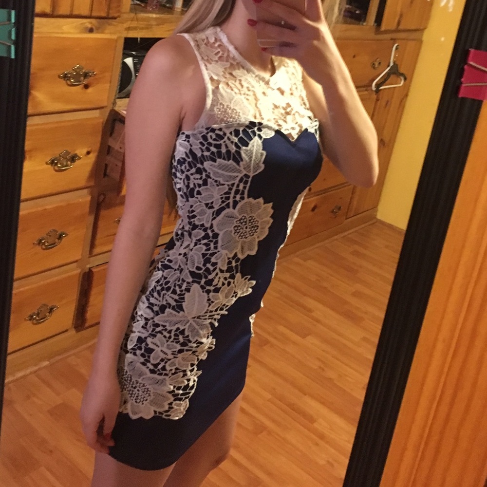 Blue and white lace Venus bodycon dress.