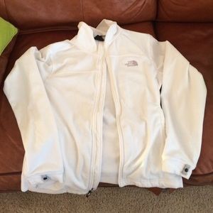 Soft white North Face jacket with zip pockets