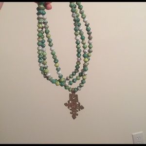 green beaded cross necklace